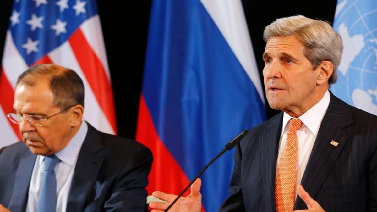 U.S. Secretary of State John Kerry, right, and Russian Foreign Minister Sergey Lavrov announce an agreement for a possible cease-fire early Friday, Feb. 12, 2016, in Munich.