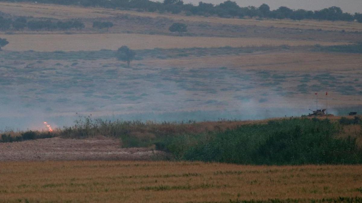 
A Turkish army tank near the border with Syria east of Kilis, in southeastern Turkey, where Islamic State militants clashed with a Turkish army patrol. It was the first clash between Turkish soldiers and the extremists. 
