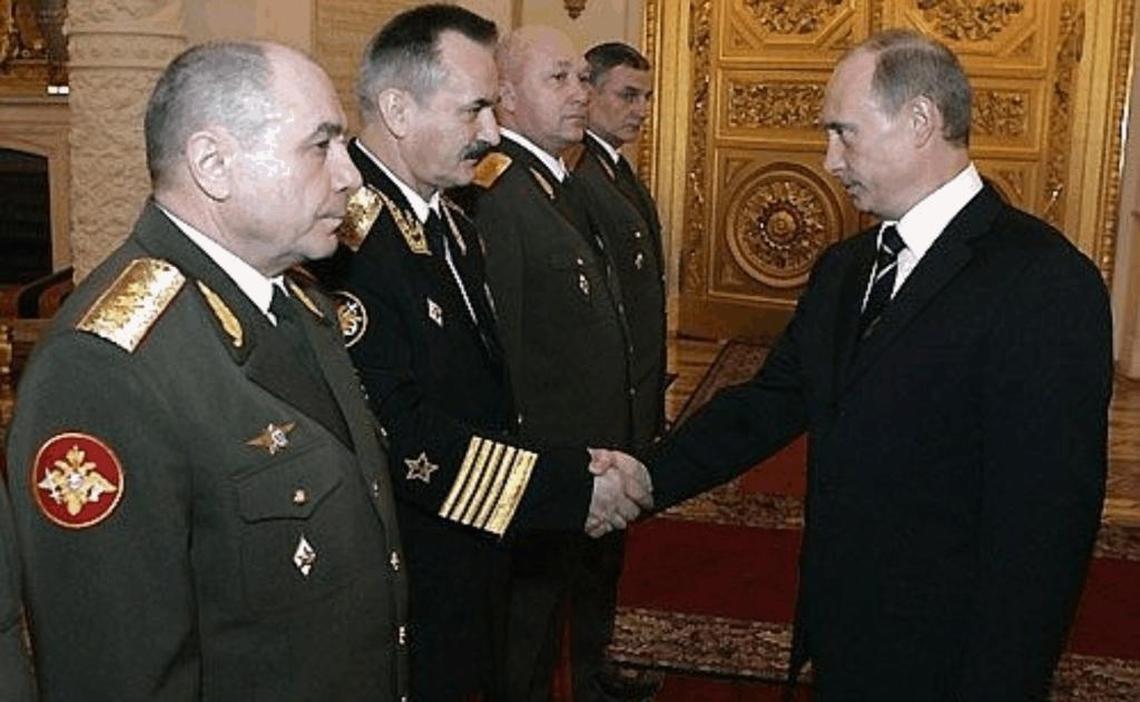 This 2007 photo published originally by the Kremlin shows Russian leader Vladimir Putin with three-star General Nikolai Tkachev, furthest to left.