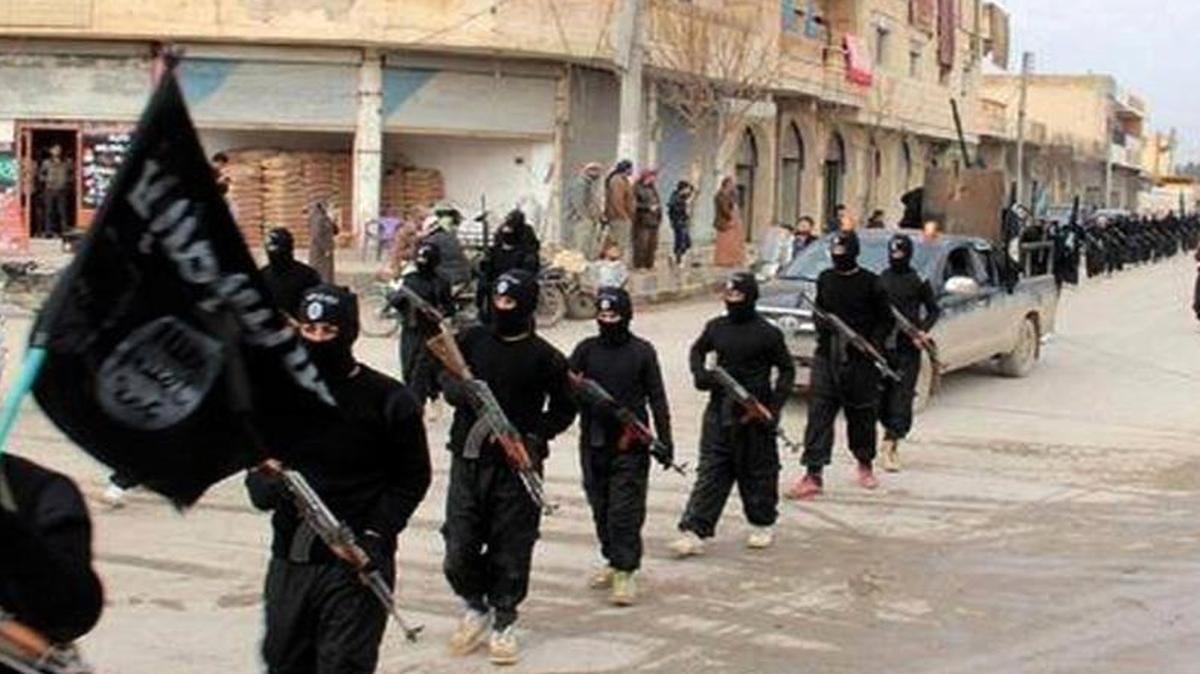 
This undated photo of victorious Islamic State forces marching in Raqqa, Syria, reflect the three-part battle in Syria among Assad regime forces, jihadists and American-supported rebels. Two rebel commanders have been assassinated in two weeks. 
