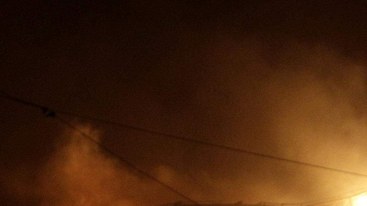 Flames are seen after an explosion at an ammunition storage facility at a military base in the rebel stronghold of Benghazi.