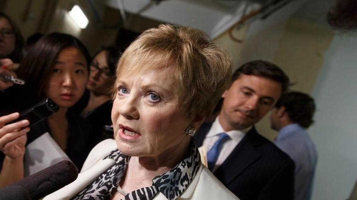 Rep. Kay Granger, R-Texas, is surrounded by reporters on Capitol Hill in Washington as she emerges from a closed-door session with fellow Republicans.