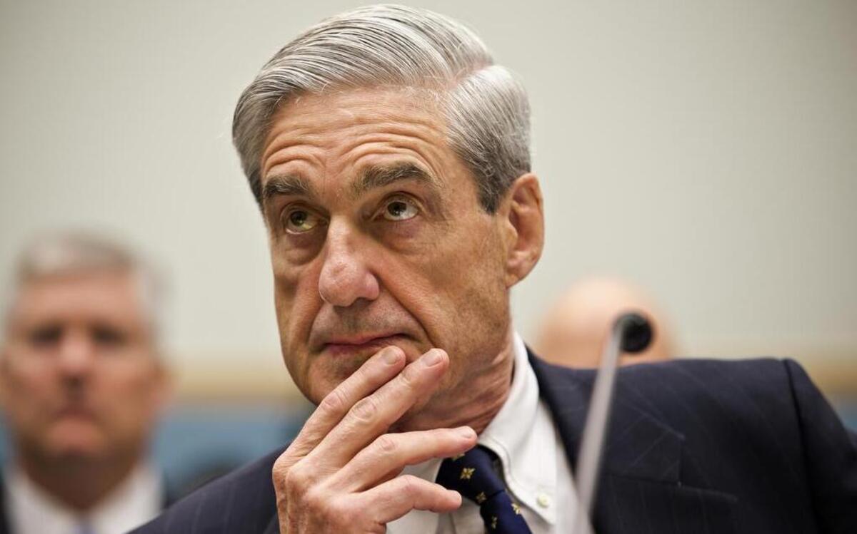 FBI Director Robert Mueller listens as he testifies on Capitol Hill in Washington, Thursday, June 13, 2013.