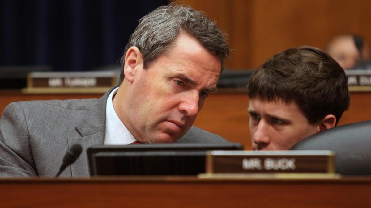 House Committee on Oversight and Government Reform member Rep. Mark Walker, R-N.C., left, speaks to a staff member on Capitol Hill in Washington, Wednesday, June 15, 2016.