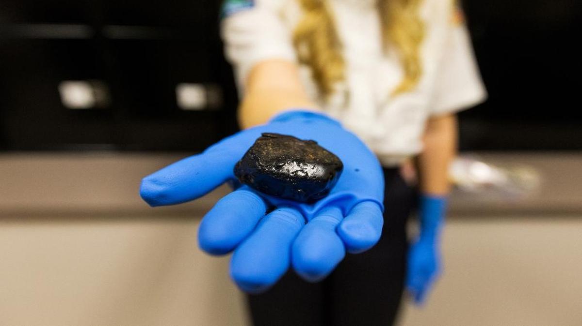 In this Jan. 27, 2016, photo, 39.6 grams of black tar heroin, with a street value of about $12,000, is among many other heroin-related items in Post Falls Police Department’s evidence room in Post Falls, Idaho. The FDA may authorize larger doses of naloxone, which reverses opioid overdoses, due to higher potency heroin laced with powerful additives like fentanyl and carfentanil.