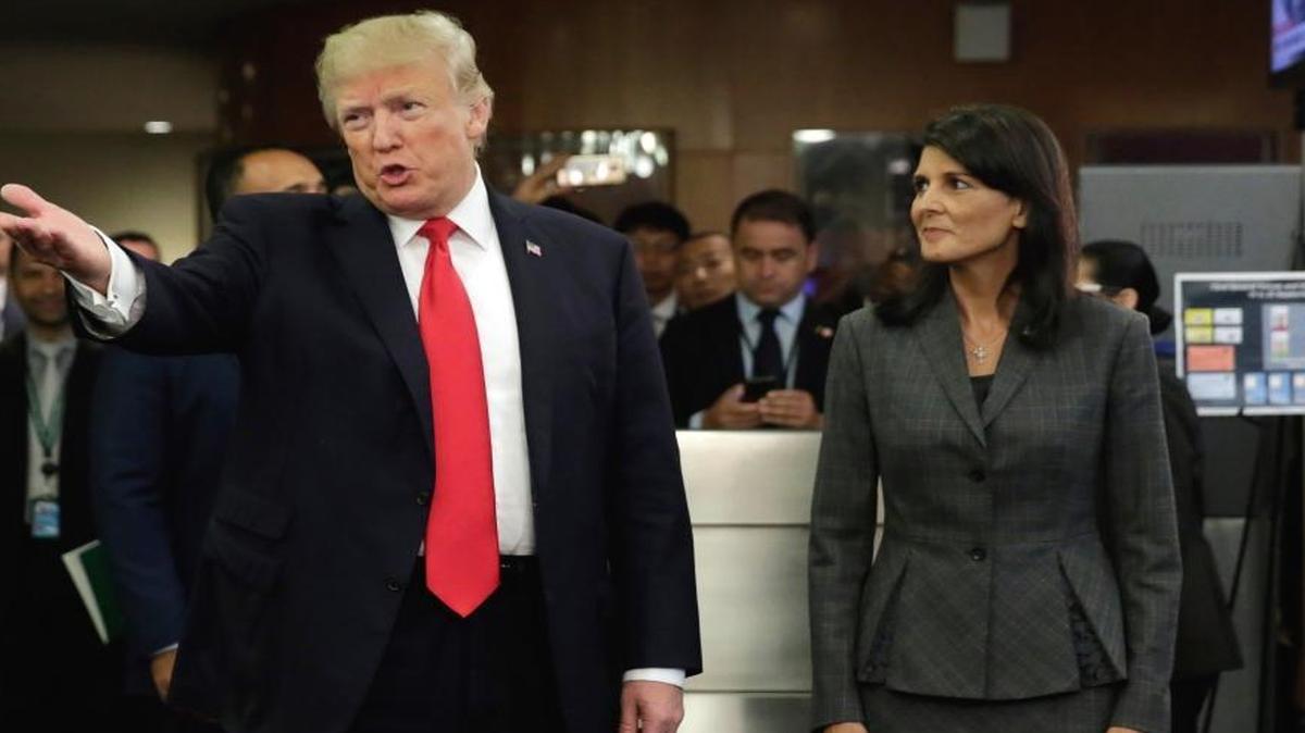 President Donald Trump, accompanied by U.S. Ambassador Nikki Haley, arrives at the United Nations Monday.
