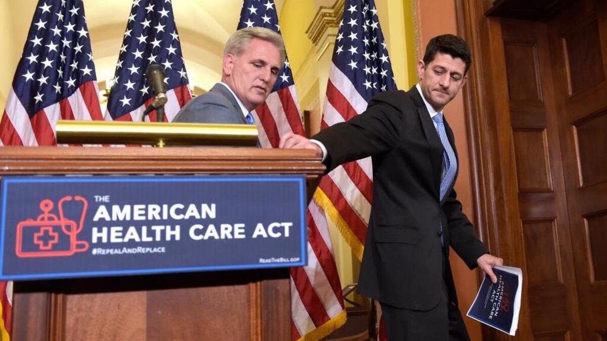 House Speaker Paul Ryan of Wis., right, takes his notes as he and House Majority Whip Kevin McCarthy, R-Calif., walk away following a news conference on the American Health Care Act on Capitol Hill in Washington, Tuesday, March 7, 2017.