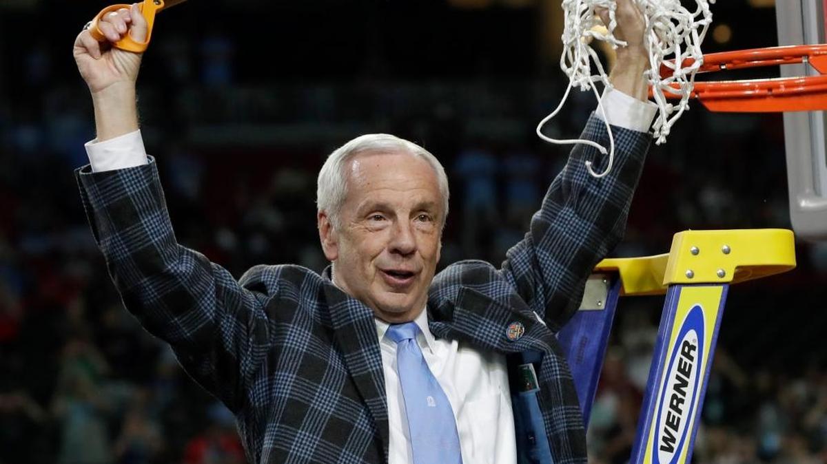 FILE - In this April 3, 2017, file photo, North Carolina head coach Roy Williams cuts down the net after the championship game against Gonzaga at the Final Four NCAA college basketball tournament, in Glendale, Ariz.