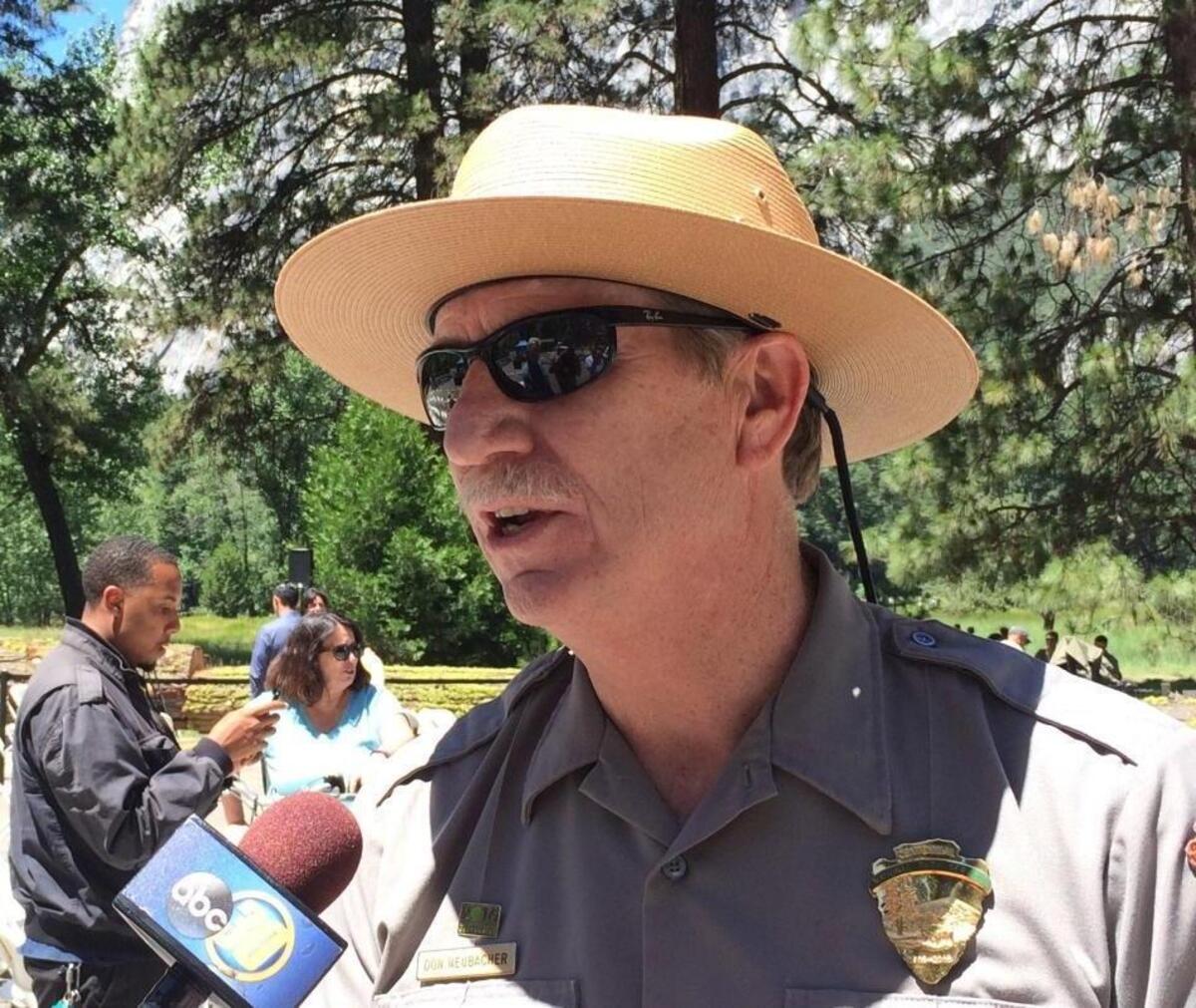 Yosemite National Park Superintendent Don Neubacher talks to reporters in August. Neubacher and his wife are both retiring.