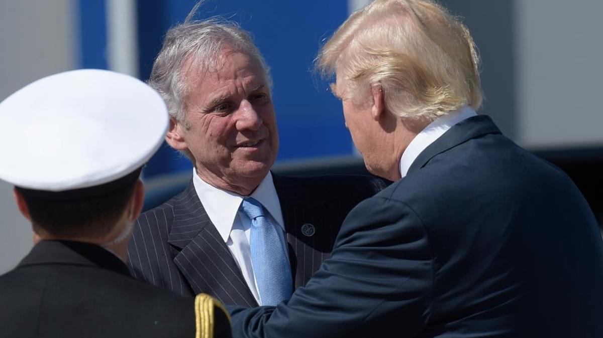 President Donald Trump shakes hands with South Carolina Gov. Henry McMaster after arriving on Air Force One at Charleston International Airport in North Charleston, S.C. in February.