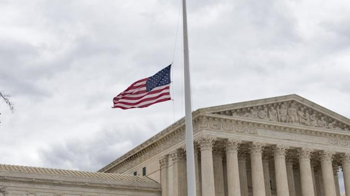In this Feb. 25, 2016, photo, the flag was at half-staff at the Supreme Court building in honor of the late Justice Antonin Scalia. Scalia’s absence will be felt in the new term that starts Monday.