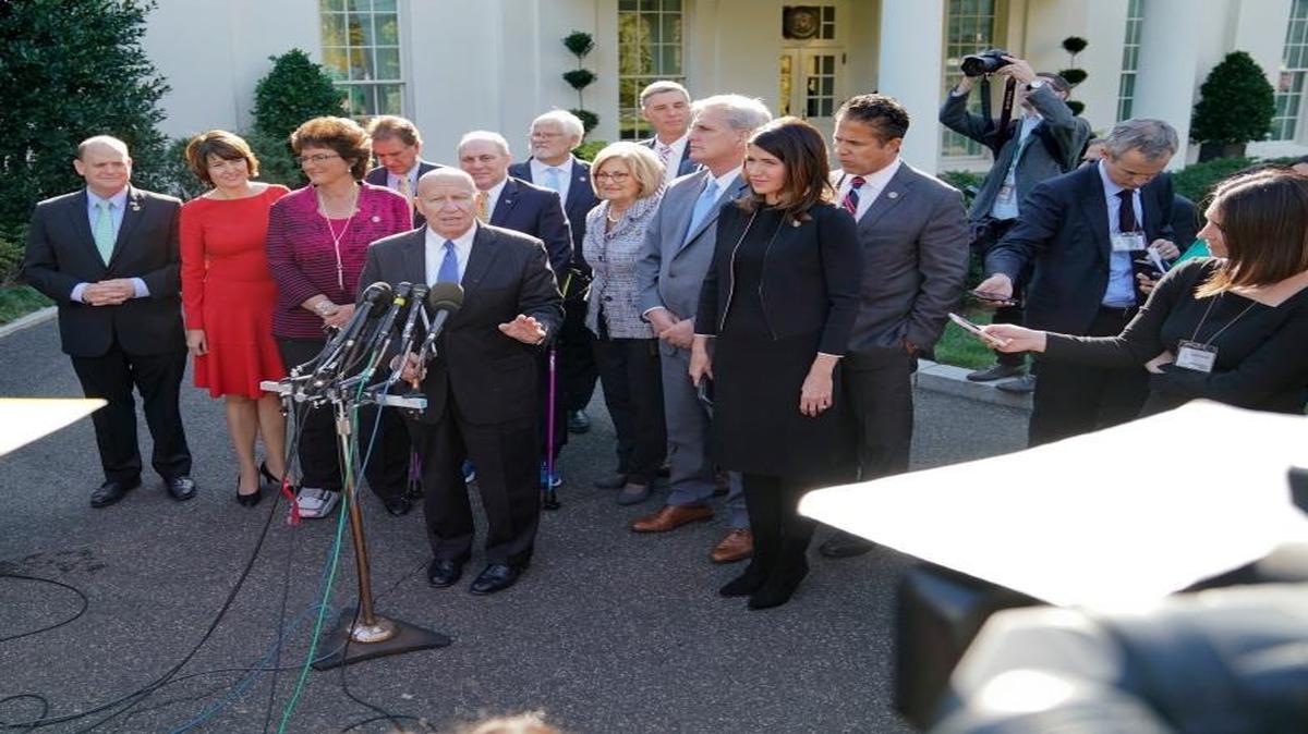 House Ways and Means Chairman Rep. Kevin Brady, R-Texas, center, speaks with reporters after a meeting with President Donald Trump at the White House, Thursday, Nov. 2, 2017, in Washington.