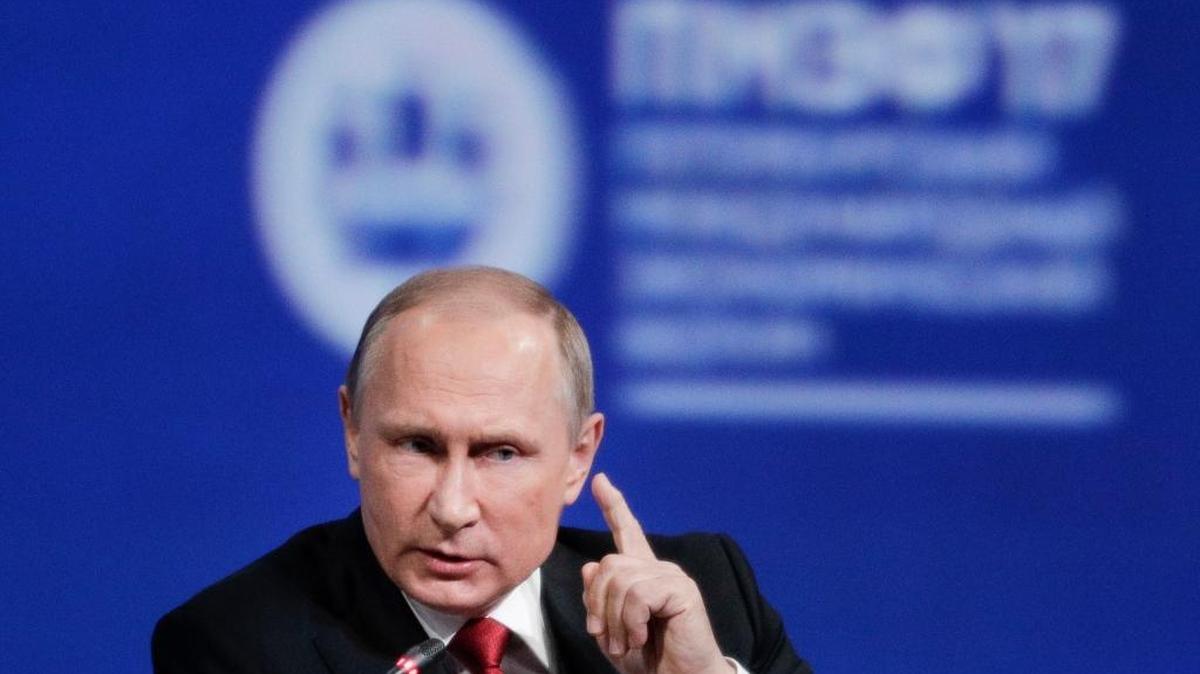 Russian President Vladimir Putin gestures as he speaks at the St. Petersburg International Economic Forum in St.Petersburg, Russia, Friday, June 2, 2017.