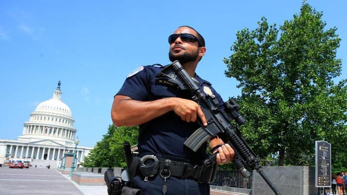 Capitol Hill Police officer Nathan Rainey stands guard on Capitol Hill in Washington on June 14, 2017, after House Majority Whip Steve Scalise of La. was shot during a congressional baseball practice in Alexandria, Va.