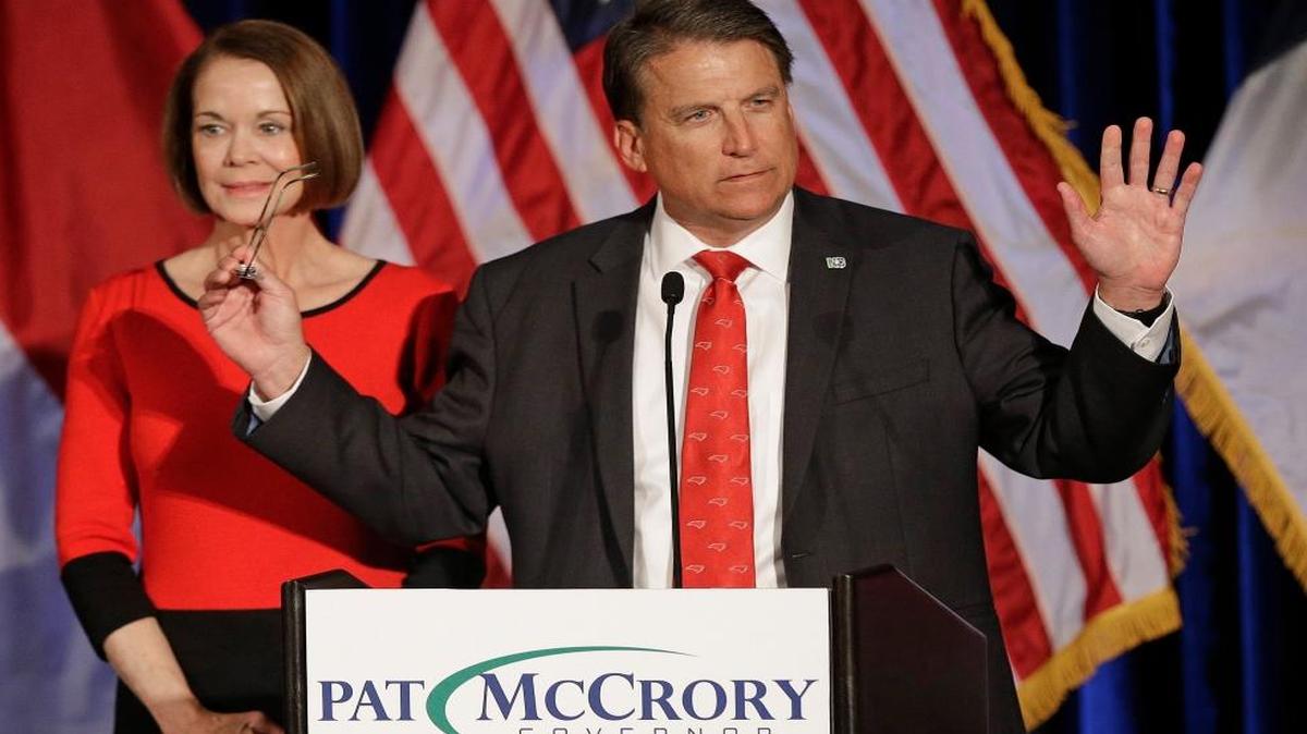 North Carolina Gov. Pat McCrory speaks to supporters as his wife Ann McCrory listens, at an election rally in Raleigh on Nov. 9.