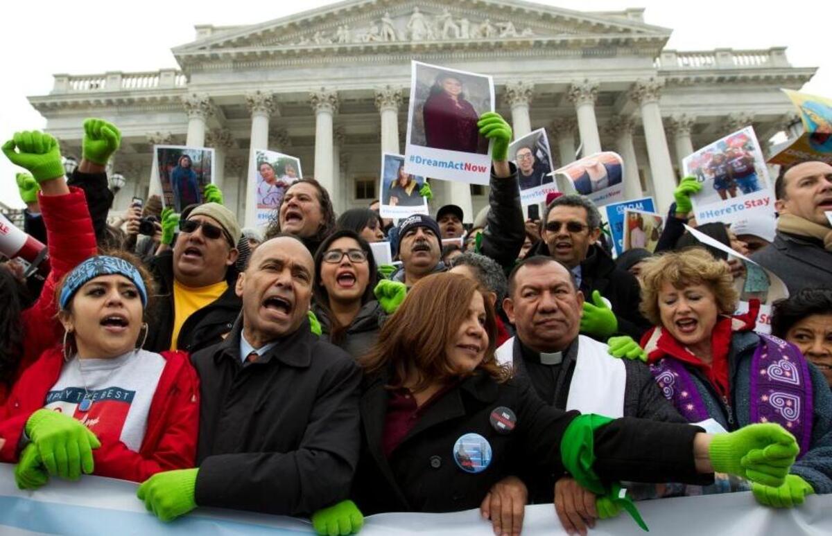 Rep. Luis Gutierrez D-Ill., third from left, along with other demonstrators protest outside of the U.S. Capitol in support of the Deferred Action for Childhood Arrivals (DACA), and Temporary Protected Status (TPS), programs, during an rally on Capitol Hill in Washington.