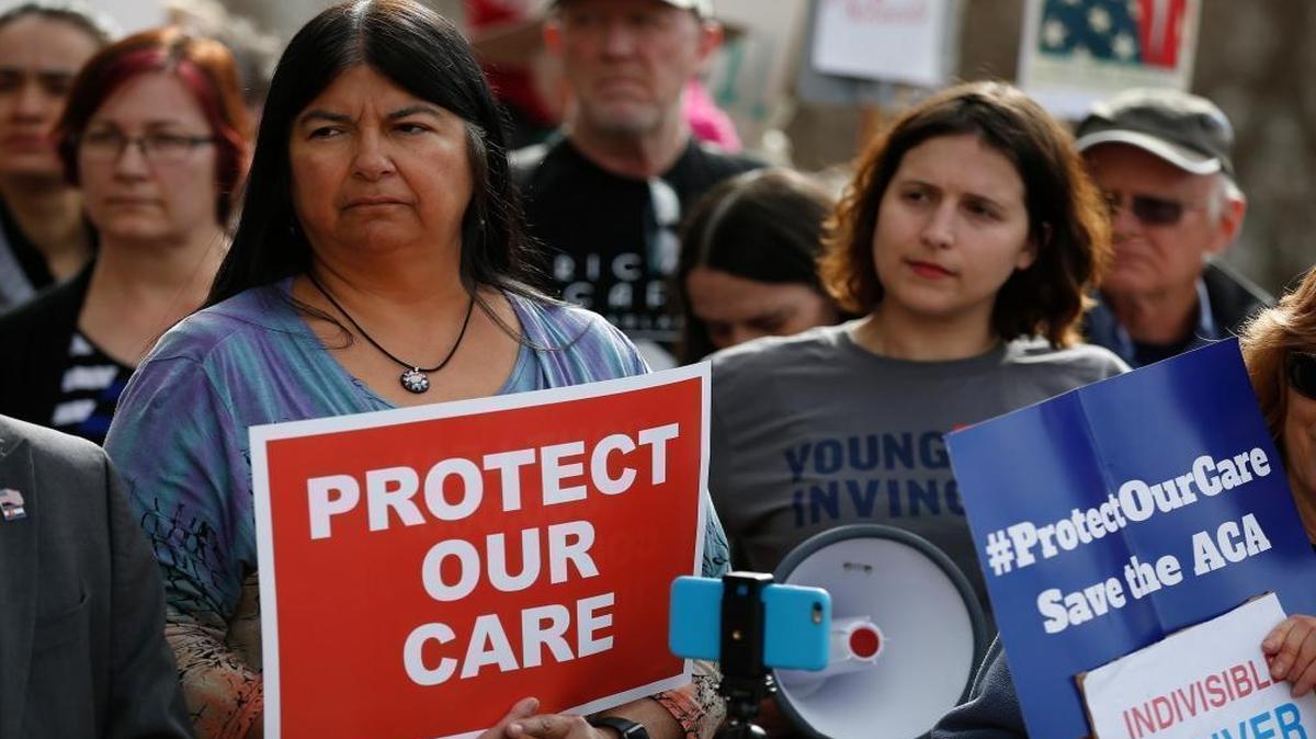 Colorado state Sen. Dr. Irene Aguilar, D-Denver, left, stands with activist Christina Postolowski, of the group Young Invincibles, as supporters of the Affordable Care Act. House Republicans are trying to revive their stalled Obamacare replacement bill with a new amendment that lets states opt out of coverage mandates and allows insurers to charge premiums based on individual health status.