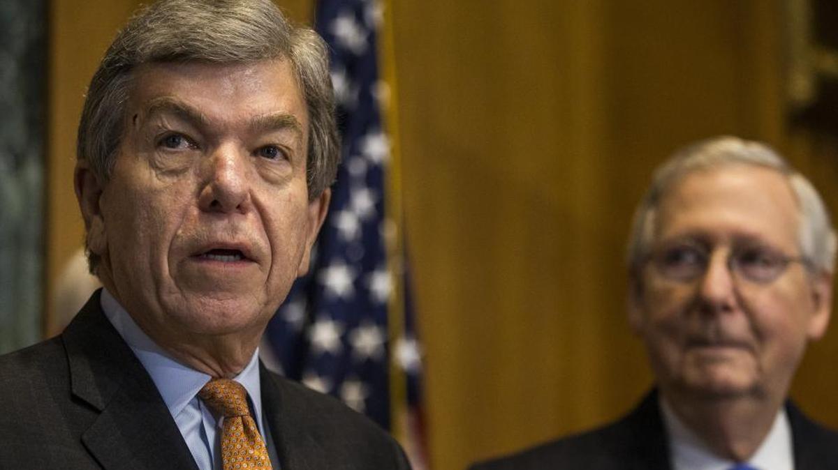 Sen. Roy Blunt (R-Mo.) speaks as Senate Majority Leader Mitch McConnell (R-KY) looks on during a news conference on proposed Republican tax legislation on Capitol Hill.