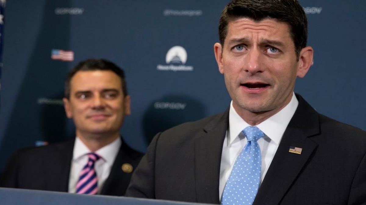 Rep. Kevin Yoder, R-Kan., watches as House Speaker Paul Ryan, R-Wis., speaks during a news conference on Capitol Hill, Wednesday, April 27, 2016. Yoder remained undecided until the last moment before voting “yes” on the Republican health bill. He is likely to face political fallout for his choice.