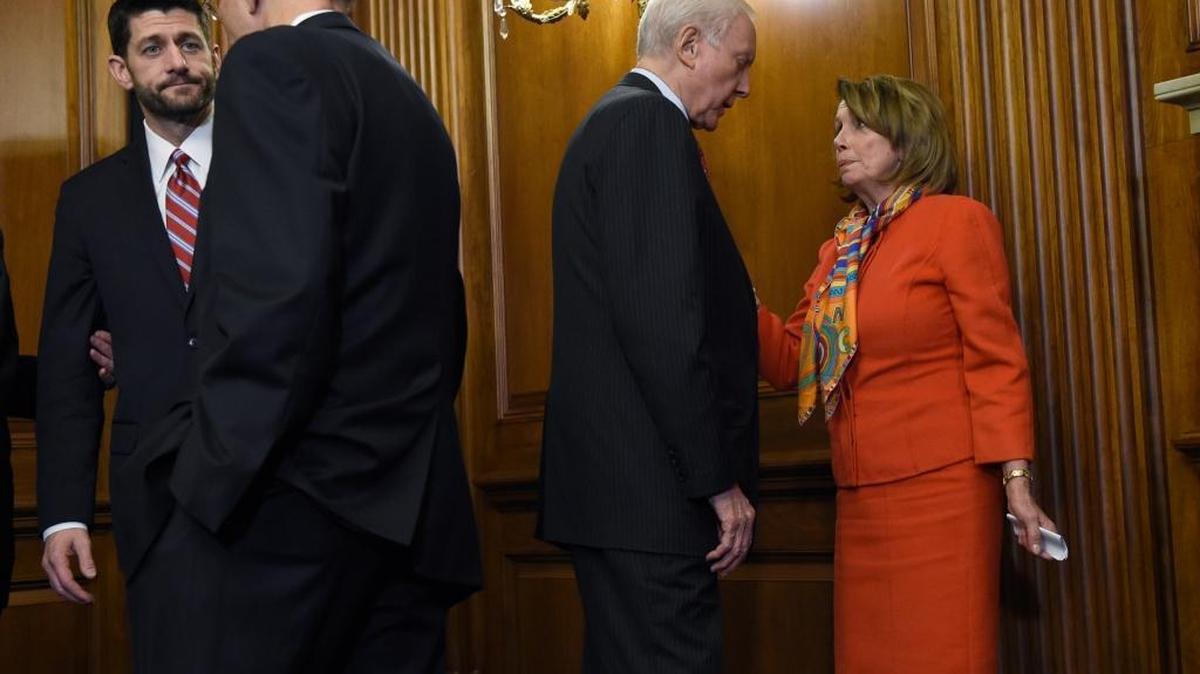 From left, House Speaker Paul Ryan, R-Wis., talks with Senate Health, Education, Labor and Pensions Committee Chairman Lamar Alexander, R-Tenn., as Sen. Orrin Hatch R-Utah, talks with House Minority Leader Nancy Pelosi, D-Calif., on Capitol Hill in Washington on Wednesday, Dec. 9, 2015, after Ryan signed legislation that changes how the nation's public schools are evaluated, rewriting the landmark No Child Left Behind education law of 2002.