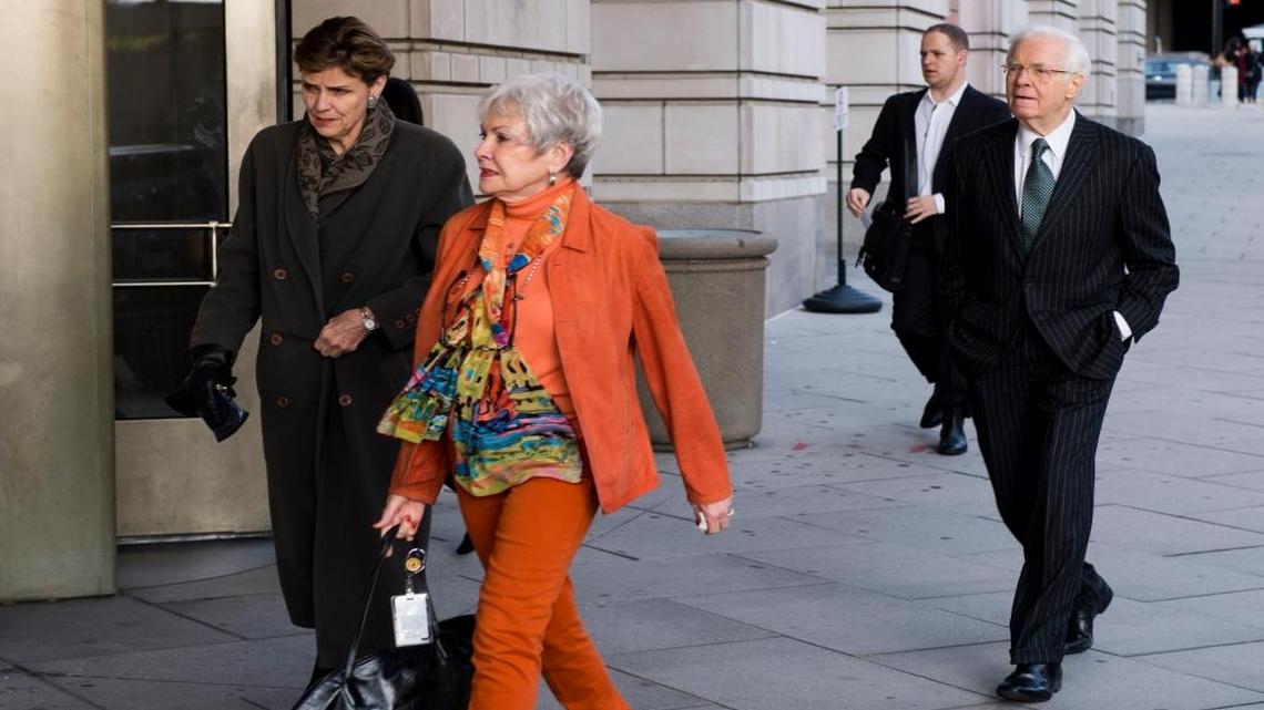 Sen. Thad Cochran, R-Miss., right, and his wife, Kay Bowen Webber, center, arrive at the E. Barrett Prettyman Federal Courthouse in Washington for the sentencing hearing for his longtime aide Fred W. Pagan on Friday, Jan. 15, 2016. Pagan pleaded guilty in August to conspiring to distribute methamphetamine.