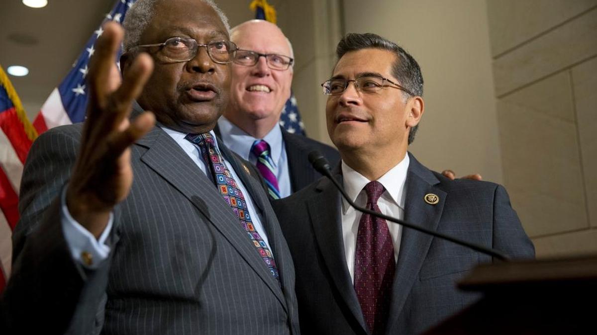 From left, House Assistant Minority Leader James Clyburn of S.C., Rep. Joe Crowley, D-N.Y., and Rep. Xavier Becerra, D-Calif., talk with the reporters on Capitol Hill in Washington, Wednesday, June 22, 2016, after a House Democratic Caucus meeting with Democratic presidential candidate Hillary Clinton.