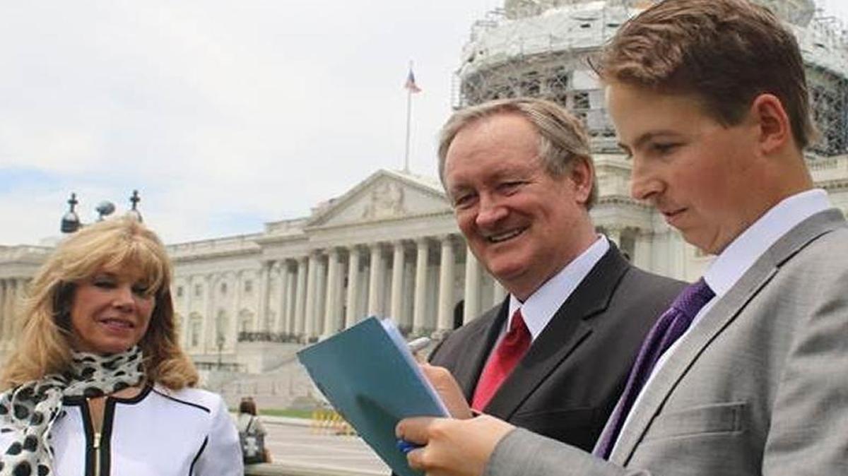 Republican Sen. Mike Crapo of Idaho, center, with Trevor Schaefer, right, and Schaefer’s mother, Charlie Smith, outside the U.S. Capitol on Wednesday, June 22, 2016.