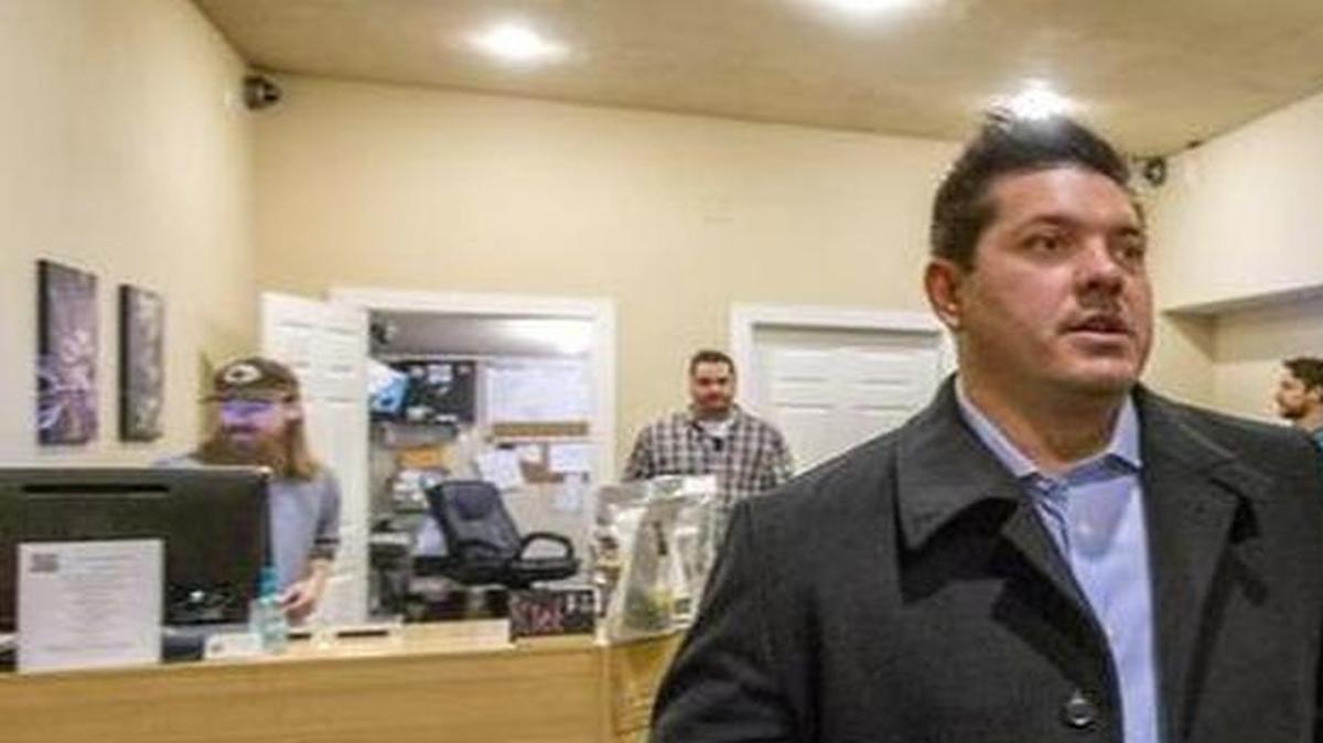 
Running an all-cash business, Brian Caldwell, president of Cannabis Club Collective in Tacoma, said he has installed a top-of-the-line alarm system, a safe and motion sensors for security. He's shown here in the dispensary’s medicine room on Dec. 3, 2014.
