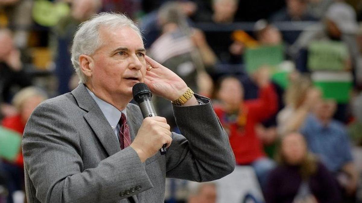Republican Rep. Tom McClintock bends his ear to hear questions from a boisterous crowd during his town hall meeting at Oak Ridge High School in El Dorado Hills, Calif., Saturday, March 4, 2017.