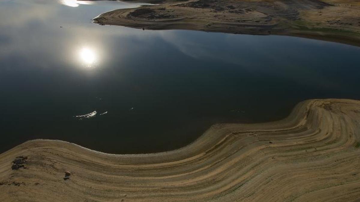 A view of the receding waterline from the east end of Folsom lake on Wednesday afternoon, October 14, 2015.