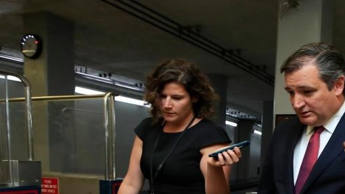 Sen. Ted Cruz, R-Texas, center, speaks to reporters on Capitol Hill in Washington.