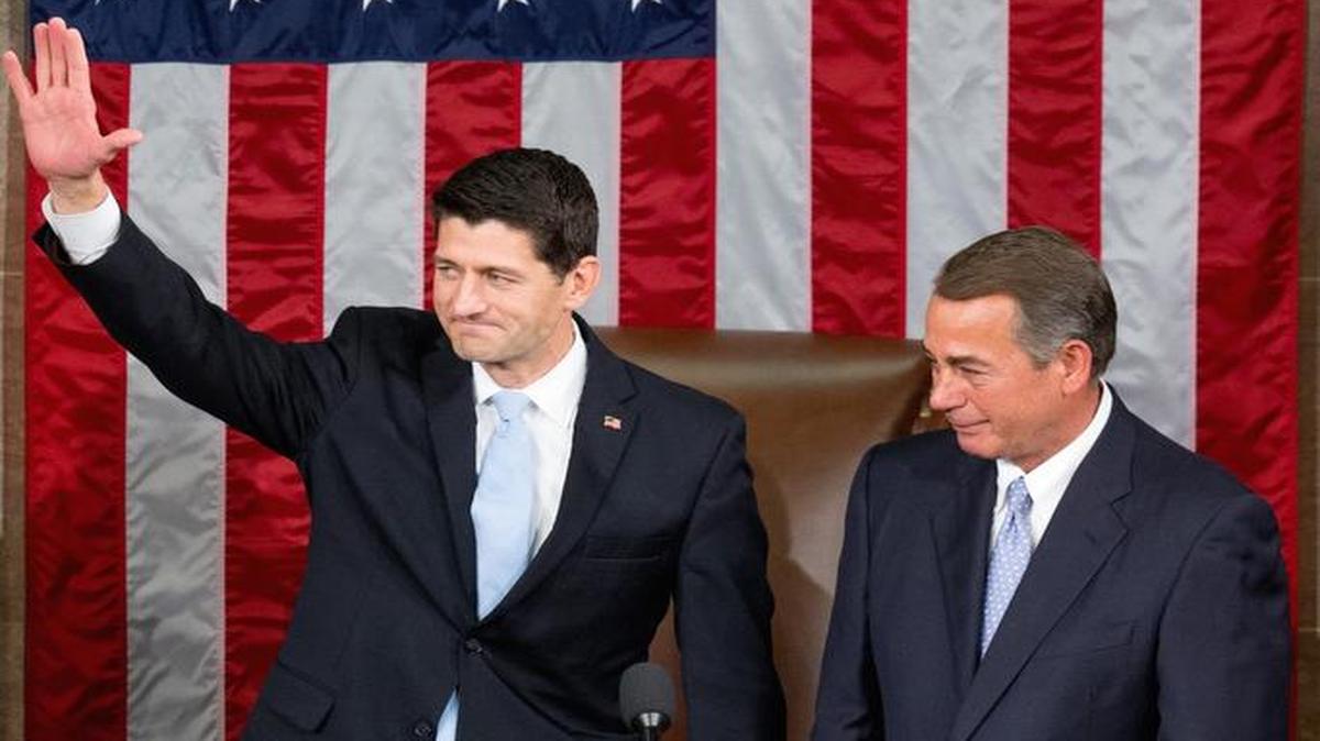 An emotional outgoing House Speaker John Boehner stands with his successor Rep. Paul Ryan, R-Wis., in the House Chamber on Capitol Hill in Washington, Thursday, Oct. 29, 2015. Republicans rallied behind Ryan to elect him the House's 54th speaker on Thursday as a splintered GOP turned to the youthful but battle-tested lawmaker to mend its self-inflicted wounds and craft a conservative message to woo voters in next year's elections.