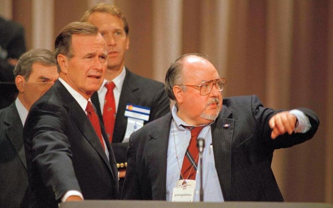 Vice President George H.W. Bush, left, gets some advice from his media adviser, Roger Ailes, right, at the Superdome in New Orleans prior to the start of the 1988 Republican National Convention.