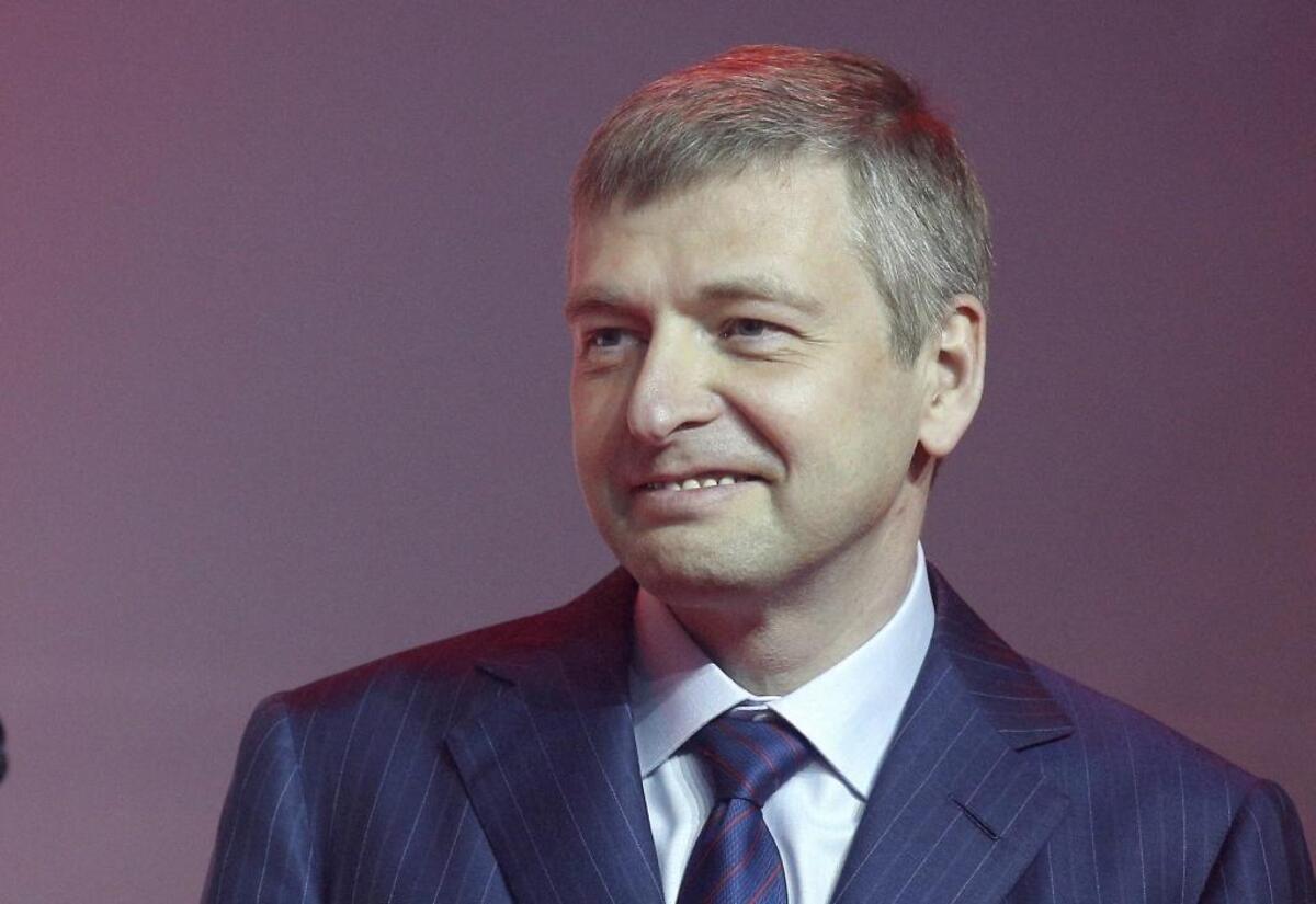 In 2013 file photo, Russian businessman and President of AS Monaco football club, Dmitry Rybolovlev, poses during the celebration of the AS Monaco 2012-13 season and their come back in the French Premier League football for the next season, in Monaco. The Trump administration has released a list of 114 Russian politicians and 96 “oligarchs” it says are linked to Russian President Vladimir Putin, but it hass decided not to issue any extra sanctions for now. The fertilizer magnate bought a Palm Beach mansion from Trump for around $95 million in 2008, a deal that Trump called in 2016 “the closest I came to Russia” when pressed on his ties to the country.