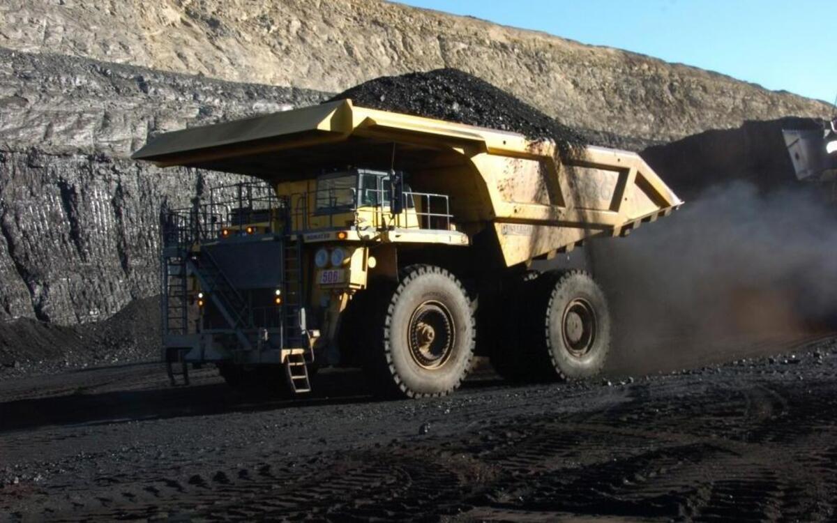In this Nov. 15, 2016, photo, a haul truck with a 250-ton capacity carries coal from the Spring Creek strip mine near Decker, Mont. President-elect Donald Trump’s vow to revive coal country is met with measured hope in Appalachia and even out West, where mines stand to gain the most.