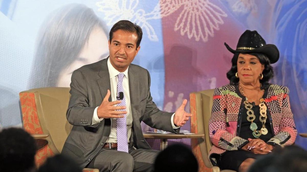 Republican Congressman Carlos Curbelo and Democratic Rep. Frederica Wilson talk about the future of politics and immigration during IMPAC Fund Immigration Summit Agenda at the University of Miami Newman Alumni Center on Tuesday, November 28, 2017.