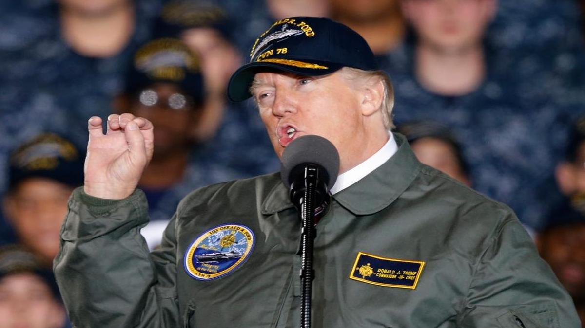 President Donald Trump, who is proposing a big military buildup, gestures as he speaks to Navy and shipyard personnel aboard the nuclear aircraft carrier Gerald R. Ford at Newport News Shipbuilding in Newport News, Va., Thursday, March 2, 2017.