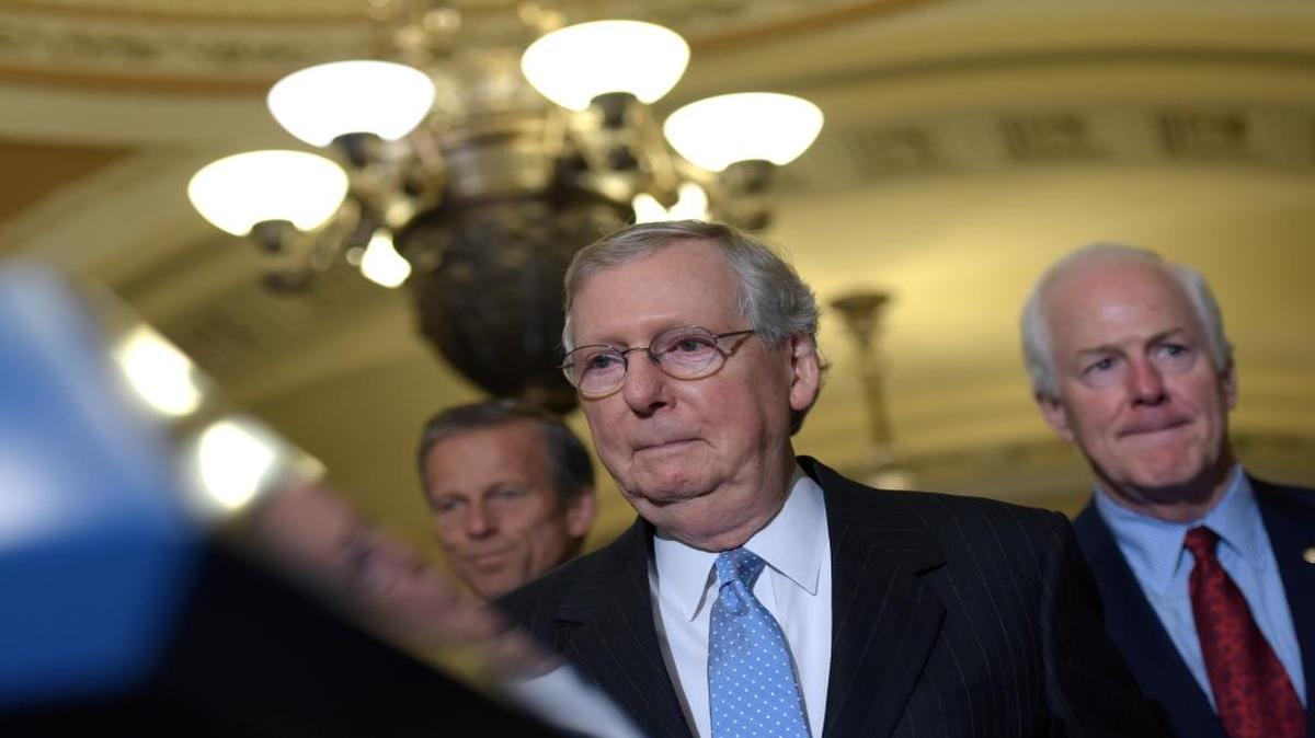 Senate Majority Leader Mitch McConnell of Ky., center, Sen. John Thune, R-S.D., left, and Senate Majority Whip John Cornyn of Texas, right, arrive for a media availability on Capitol Hill in Washington, Tuesday, Sept. 13, 2016.