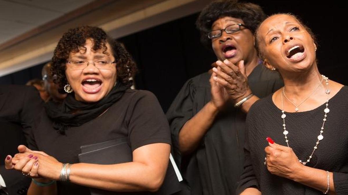 
Members of the choir at Washington D.C.'s Metropolitan African Methodist Episcopal Church, including Maria Wallace (center), sing at an event sponsored by the South Carolina Business Council and South Carolina State Society on Capitol Hill in Washington, D.C., July 8, 2015. Lawmakers and citizens gathered to show support for the families of the nine worshippers murdered in Charleston's Emanuel AME Church last month.
