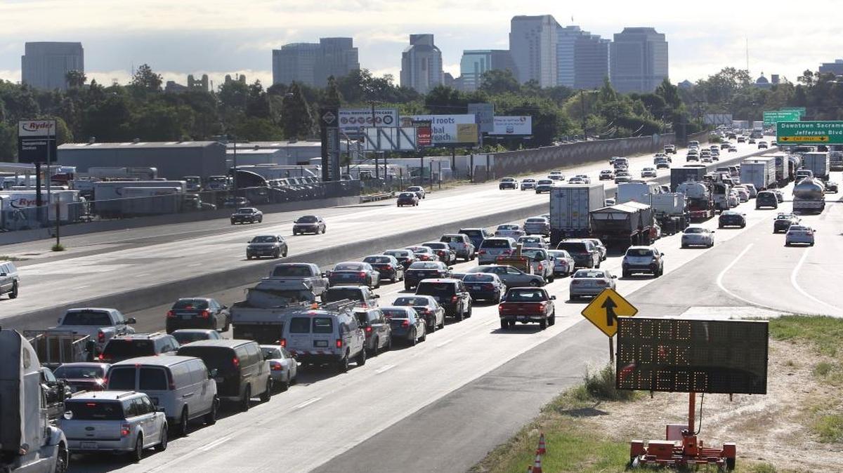 California’s senators are attacking an anticipated move by the Environmental Protection Agency to revoke the state's waiver allowing stronger auto pollution standards than the federal government. In this April 22, 2014, file photo, drivers entering Sacramento on Highway 50 come to a near-standstill as traffic backs up in West Sacramento, Calif.
