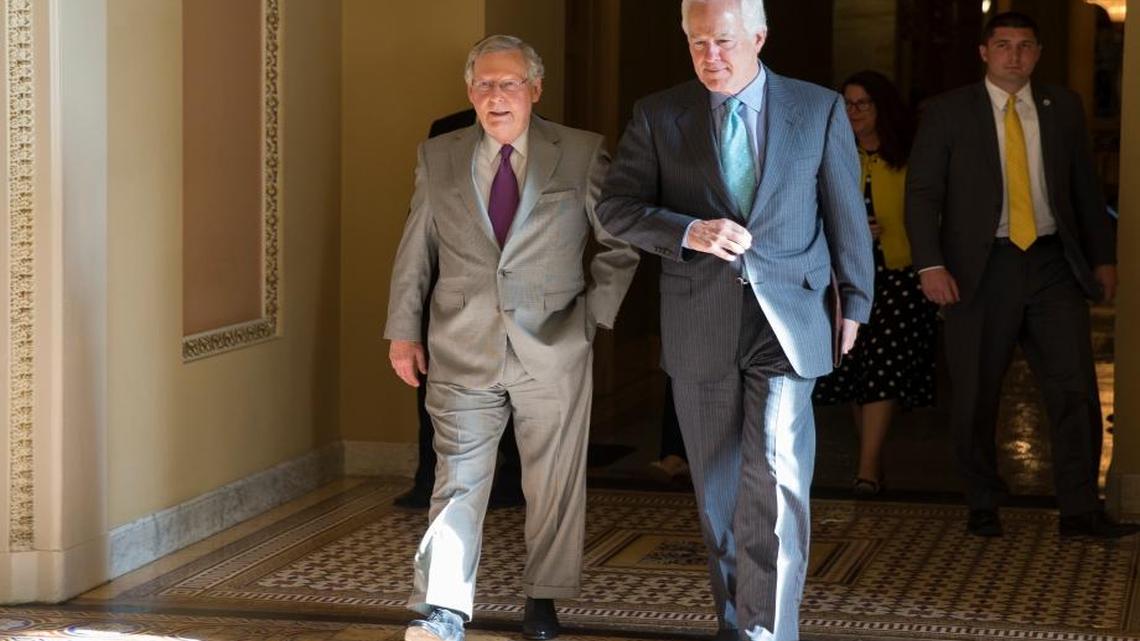 Senate Majority Leader Sen. Mitch McConnell, R-Ky., left, and Sen. John Cornyn, R-Texas, were opposed to a bipartisan bill that prevents people on the no-fly lists from buying guns. They think it falls short on due process.