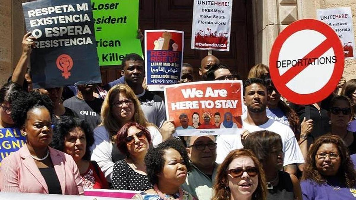 Maria Rodriguez, director of the Florida Immigrant Coalition, leads a group of Dreamers, TPS holders, elected officials, faith leaders, labor, and community organizations attending a rally to defend the Deferred Action for Childhood Arrivals (DACA) program in front of the MDC Freedom Tower in Miami, on Sept. 05, 2017.