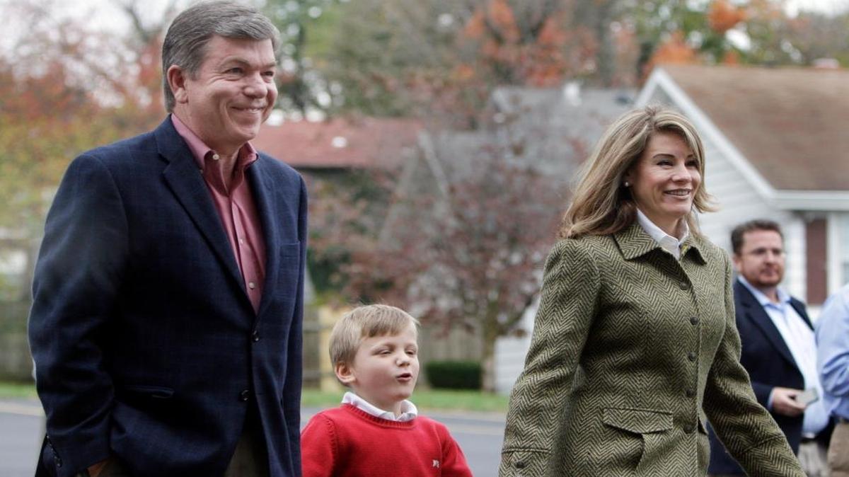 Missouri Republican U.S. Senate candidate Roy Blunt, left, and his wife Abigail Blunt walk into their polling place to vote along with their 5-year-old son Charlie on Nov. 2, 2010, in Springfield, Mo.