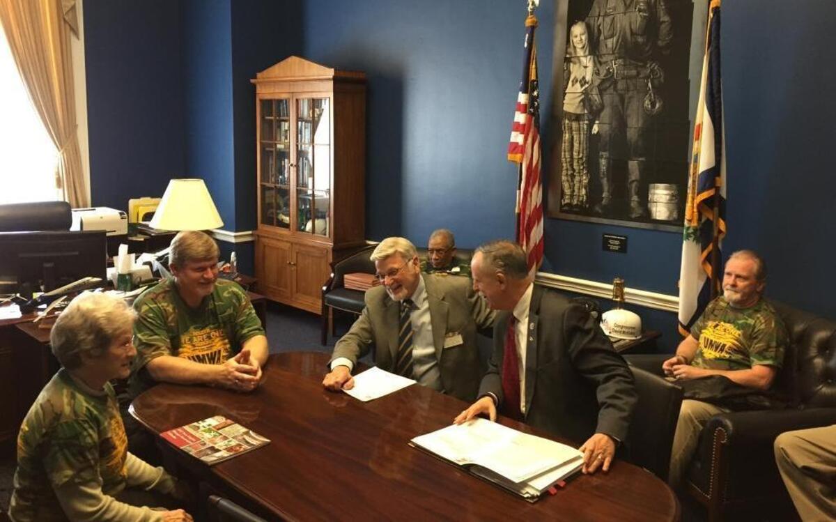 Rep. David McKinley, R-West Virginia, speaks to, from left, Shirley Inman of Madison County, West Virginia, Rick Ryan of Alum Creek, West Virginia and Cecil Roberts, president of the United Mine Workers of America, at McKinley’s Capitol Hill office on March 22, 2017.