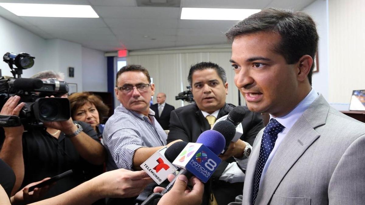 U.S. Rep. Carlos Curbelo answers reporters’ questions in Miami in October.