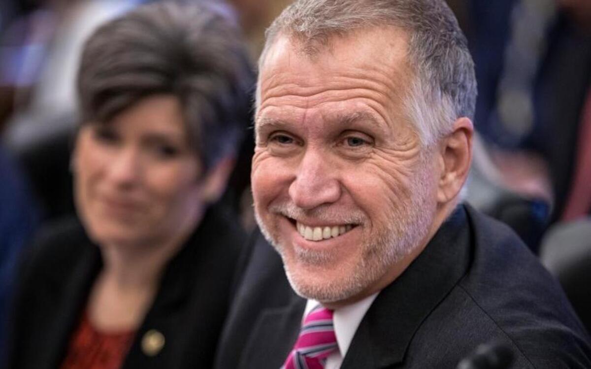 Senate Agriculture Committee members Sen. Thom Tillis, R-N.C., and Sen. Joni Ernst, R-Iowa, join other members of the committee on Capitol Hill in Washington, Jan. 20, 2016, as the panel approved new measures to set fat, sugar and sodium limits in school lunches.