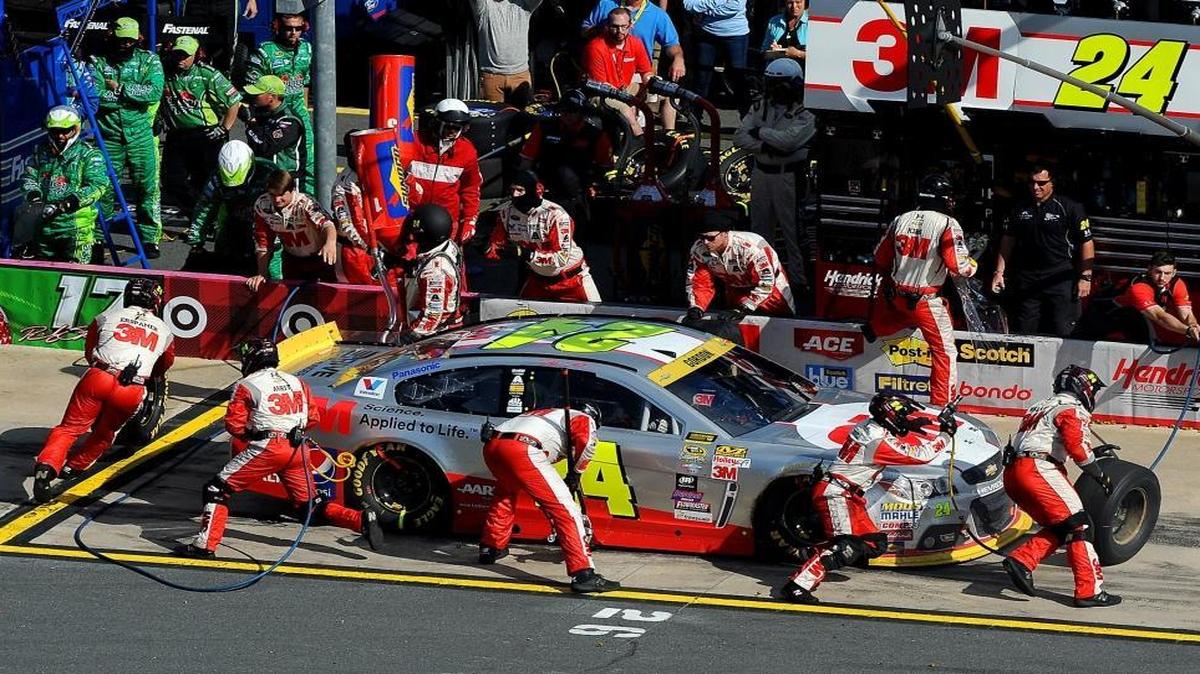 FILE – NASCAR driver Jeff Gordon's pit crew works at Charlotte Motor Speedway. Proposed EPA rules wouldn’t impact professional drivers but could mean amateur and hobbyist racers can’t drive vehicles that don’t meet Clean Air Act standards.