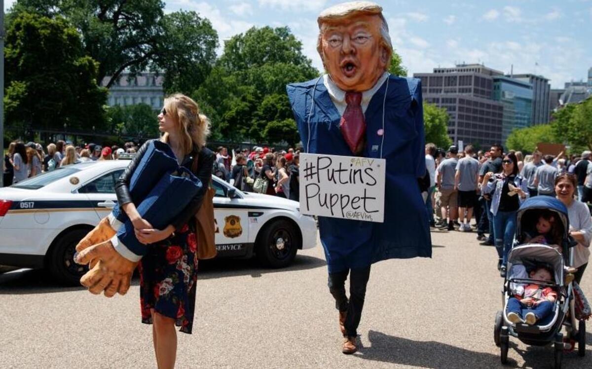 Demonstrators gathered outside the White House on Wednesday, May 10, 2017, to protest President Donald Trump’s firing of FBI Director James Comey.