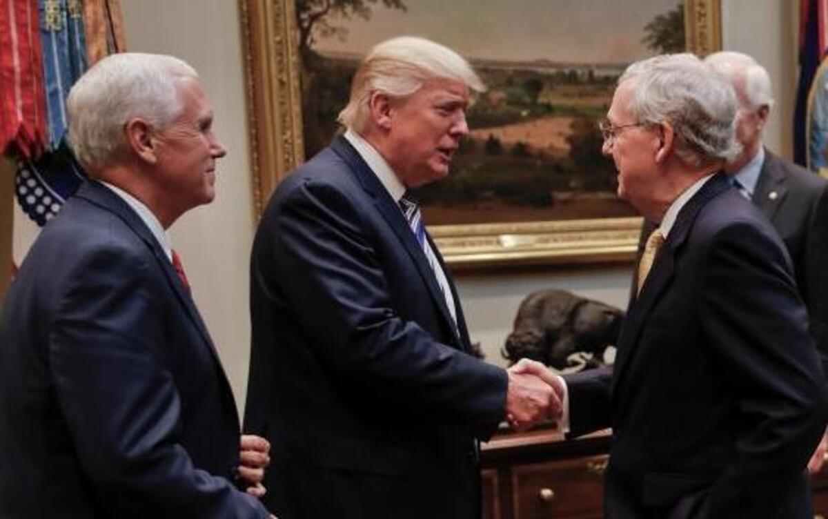 President Donald Trump shakes hands with Senate Majority Leader Mitch McConnell of Ky., center, before the start of a meeting with House and Senate Leadership in the Roosevelt Room of the White House in Washington, Tuesday, June 6, 2017. Among the topics: Health care. Also in the room are from left, Vice President Mike Pence, Senate Majority Whip John Cornyn, R-Texas, House Majority Leader Kevin McCarthy of Calif., House Speaker Paul Ryan of Wis., and Senior adviser to President Donald Trump Jared Kushner.