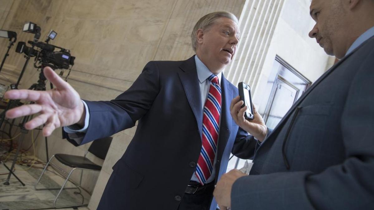 Sen. Lindsey Graham, R-S.C., chairman of the Senate Judiciary Subcommittee on Crime and Terrorism, reacts to questions on the firing of FBI Director James Comey by President Donald Trump on Capitol Hill in Washington, early Wednesday, May 10, 2017.